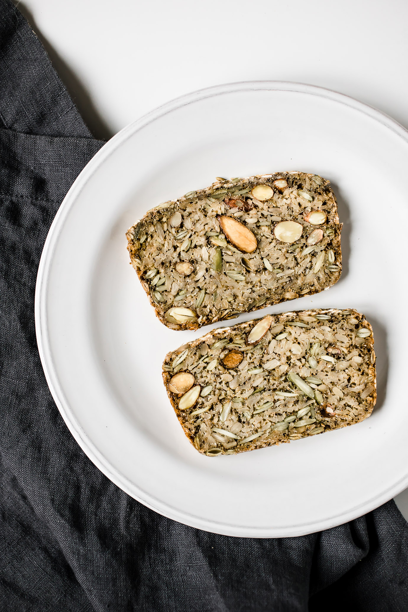vegan nut and seed bread slices on plate