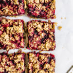 mixed berry crumble bars sliced into squares