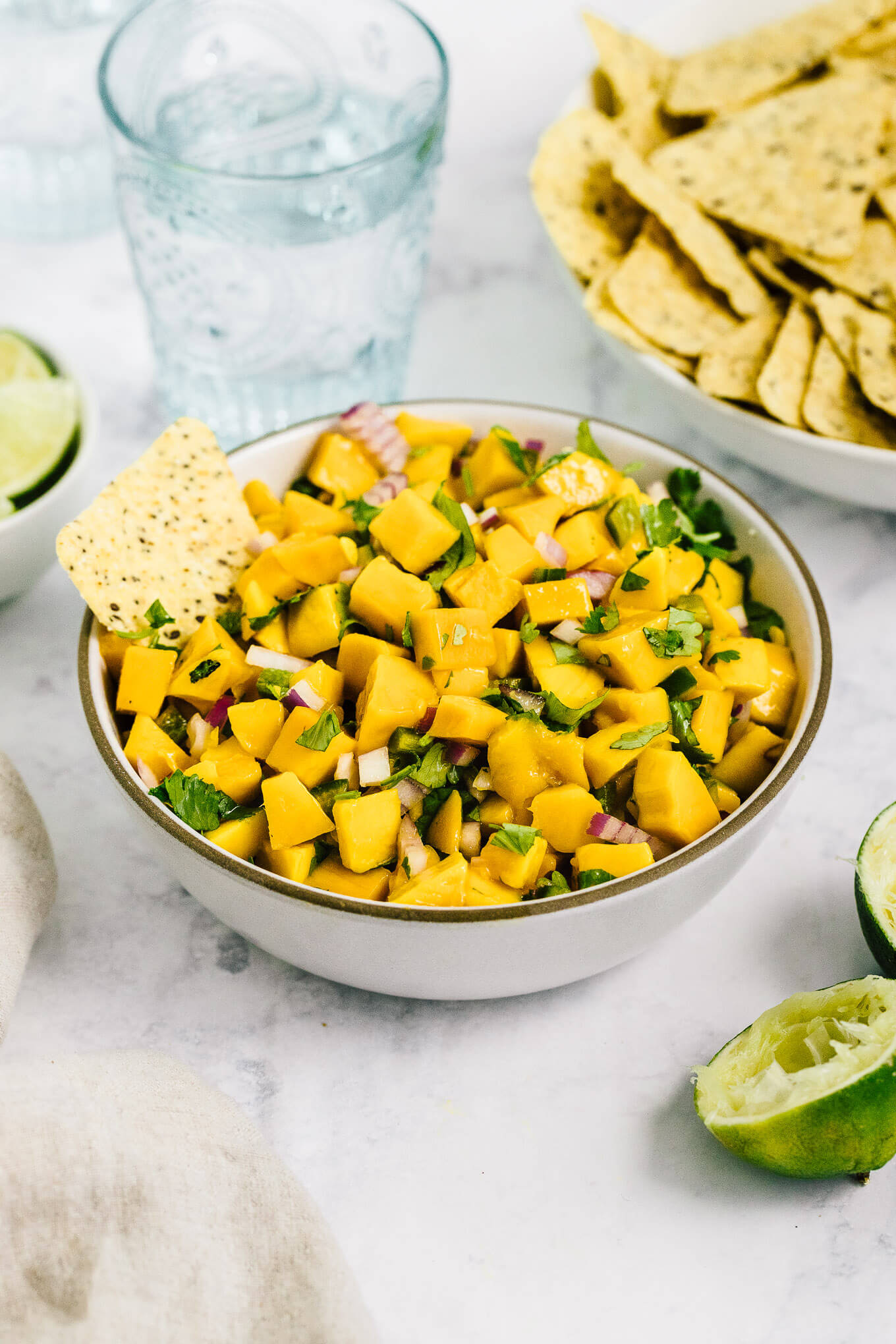 Fresh mango salsa - this 5 ingredient recipe makes for a healthy summer dip. 