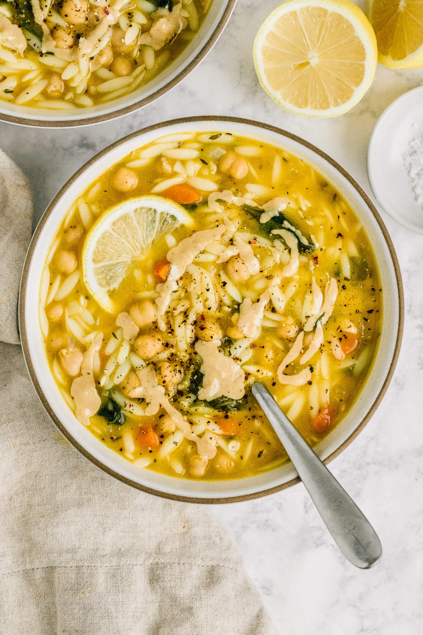 lemon chickpea orzo soup with tahini drizzle
