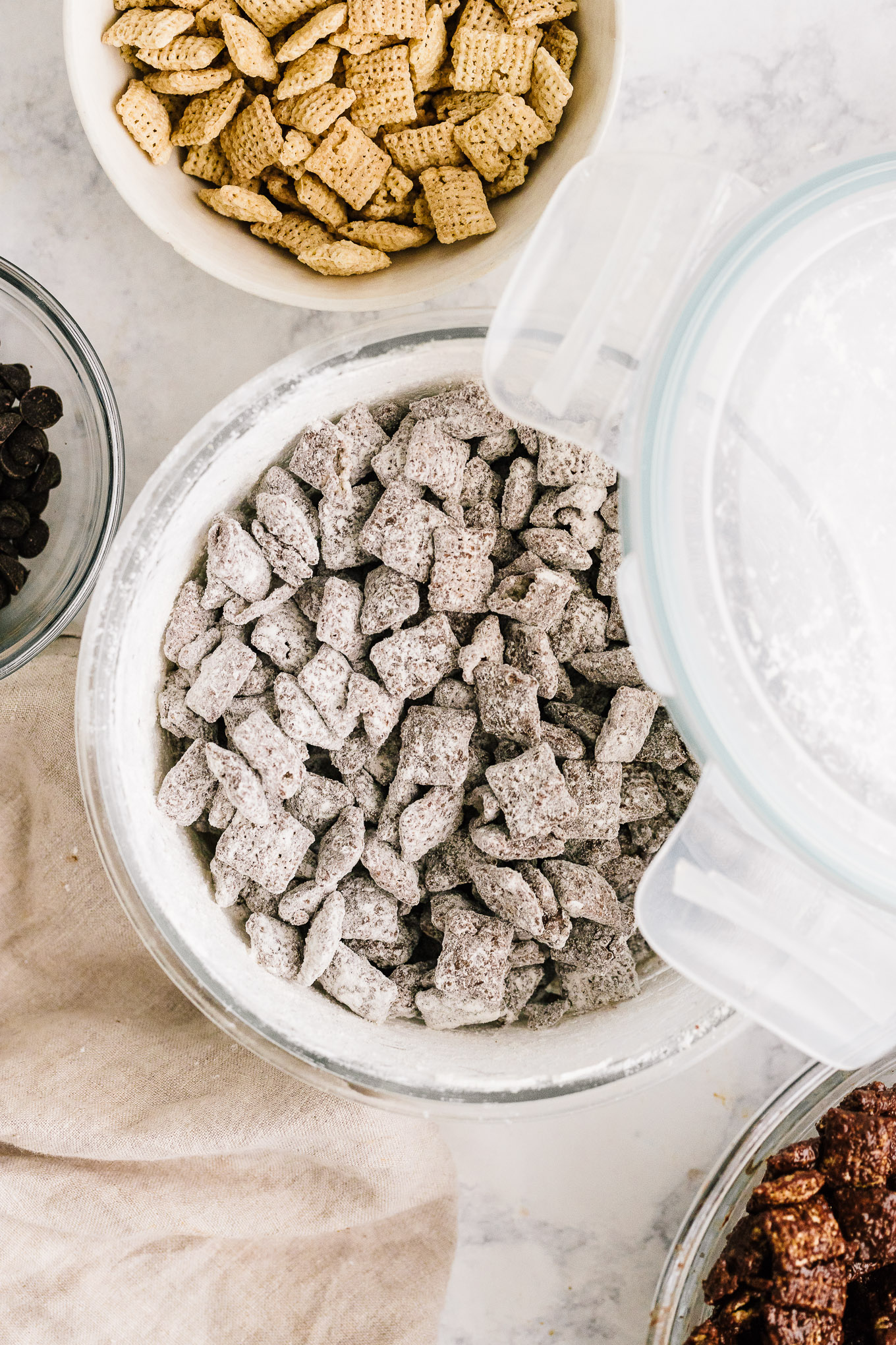 chocolate peanut butter covered chex cereal with powdered sugar (monk fruit)