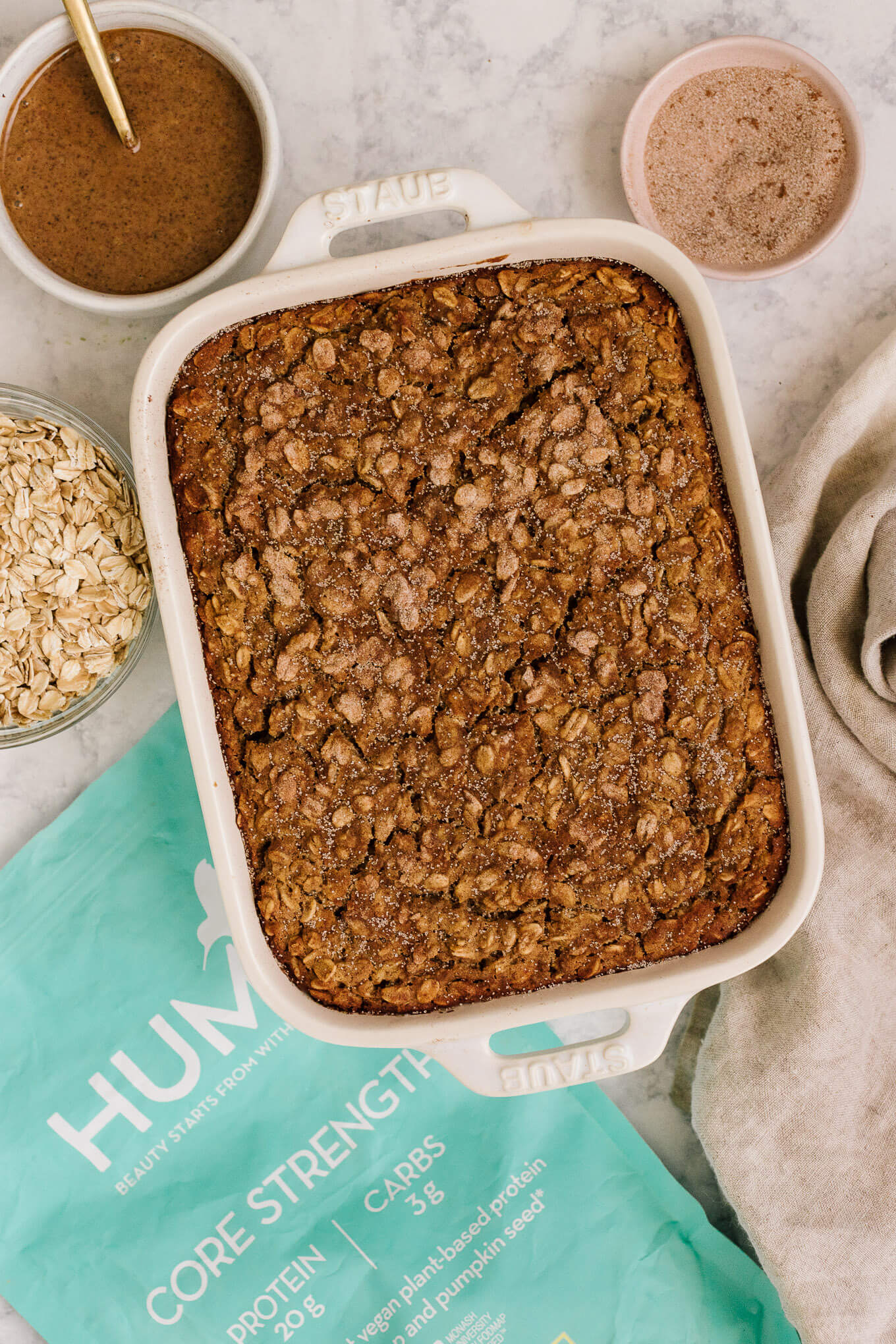 Gluten-free vegan snickerdoodle protein baked oatmeal with HUM Nutrition Core Strength vegan protein powder